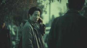 2010年,年仅10岁的刘尚瑾在上海一家中医馆内坐诊,现场挤满了人